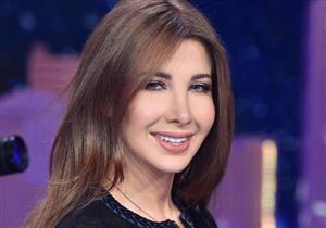 صورة .. نانسي عجرم وزوجها يحتفلان بعيد ميلاد "ميلا وإيلا "