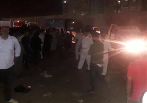 بالصور.. الشرطة تزيل إشغالات بميدان المحطة في حلوان