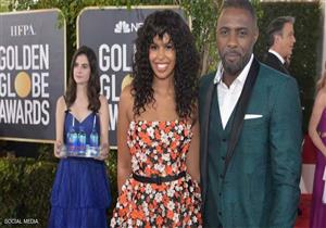 الفتاة التي خلف نجوم "جولدن جلوب" تخطف الأضواء