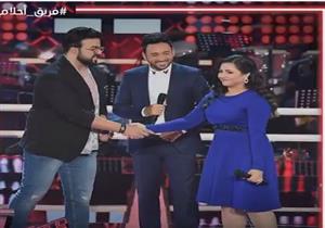 فيديو| رغم خسارته.. شاهد كيف كافأت أحلام متسابقا فلسطينيا في "The voice"