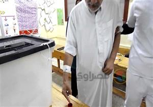 سيارات مجهزة لنقل الراغبين في الاستفتاء من مرضى مستشفيات جامعة المنصورة - صور