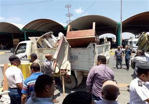 بالصور- إزالة الباعة الجائلين وإشغالات الطريق بالموقف الجديد في الإسكندرية