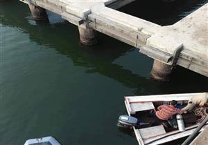 بالصور.. انتشال جثة شاب سقط من أعلى كوبري علوي بدمياط 