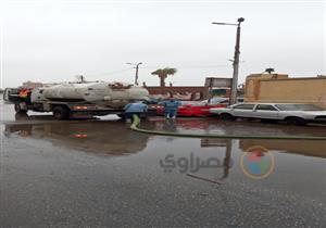 صور.. انتشار 180 معدة وسيارة لشفط مياه الأمطار في أسيوط