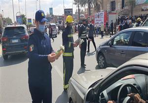 احتفالا بيومها العالمي.. الحماية المدنية بالجيزة توزع وردًا وكتيبات إرشادية على المواطنين