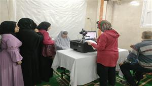 استخراج بطاقة الرقم القومي لـ 100 سيدة بالمجان في الإسكندرية - صور