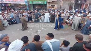 "غية الرجال".. التحطيب عصا المحب في ساحة السلطان الفرغل بأسيوط - فيديو وصور