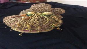 "شرنقة النخيل".. معرض فني لوكيل كلية التربية النوعية في أسوان - صور