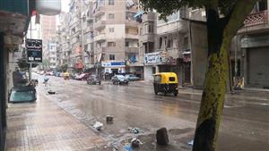 بالصور- "الفيضة الصغرى" تضرب الإسكندرية بأمطار غزيرة