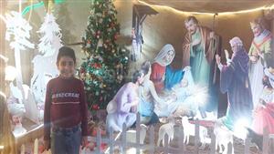 بابا نويل وزينة الكريسماس.. بهجة الأعياد داخل كنائس أسيوط (فيديو وصور)