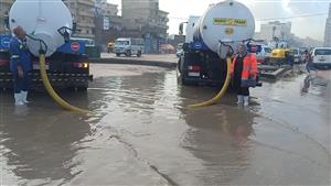 تأمين طرق المدارس.. هطول أمطار رأس السنة على الإسكندرية- صور