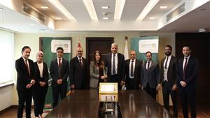 البنك الأهلي يواصل توافقه مع معاییر فيزا وماستر كارد