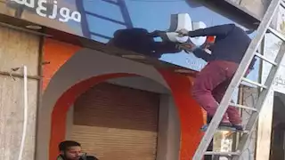 حملة لإزالة الإعلانات غير المرخصة فى الوادي الجديد