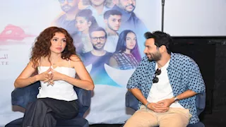 جيهان شماشرجي بتوب أبيض في مؤتمر "هيبتا: المناظرة الأخيرة" (صور)