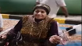 فرحة استثنائية.. سيدة على كرسي متحرك تشارك في احتفالات المتحف المصري الكبير