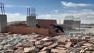 25 حالة إزالة لمخالفات بناء وتعديات على أراض بالجيزة- (صور)