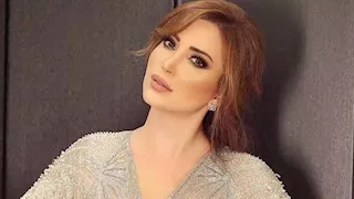 نسرين طافش بإطلالة شتوية راقية.. البالطو الطويل يبرز أناقتها