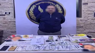 ضبط شخص يوزّع أموالًا وكروت دعاية لشراء الأصوات بالسلام ثان