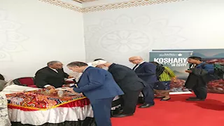 الوفد المصري يحتفل بتسجيل الكشري في اليونسكو بتقديمه للوفود المشاركة