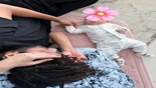 زوجة النني تنشر صورة رومانسية لهما مع ابنهما وتعلق:" اكفِهما شر الإنس والجن"