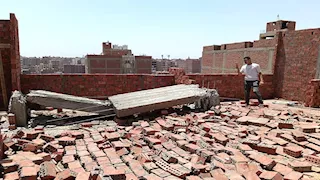 الجيزة تزيل 3 أدوار مخالفة في الهرم وتتوعد المخالفين -(صور)