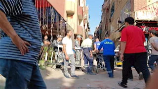 فرق الإنقاذ تنتشل "ضياء" بعد 30 ساعة بين ركام عقارات القبة المنهارة |صور 