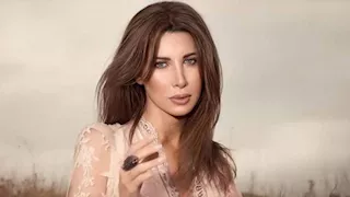 نانسي عجرم تخطف الأنظار بإطلالة ساحرة.. لماذا اختارت البدلة النسائية؟