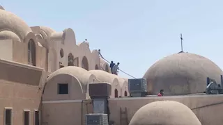 السيطرة على حريق داخل كنيسة العذراء بإسنا -صور 
