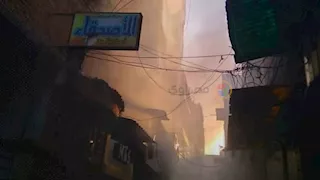 حريق مخزن "أحذية" درب آية.. 30 دقيقة فصلت الموسكي عن جحيم النار   