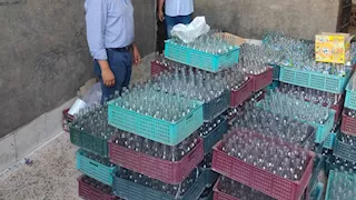 ضبط مصنع غير مرخص لعصائر مغشوشة ومصادرة 888 زجاجة بأسيوط (صور)