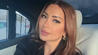 بـ "فستان أحمر".. 10 صور لـ نسرين طافش من أحدث جلسة تصوير