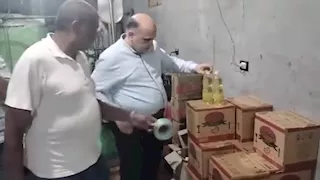 ضبط مصنع غير مرخص يعيد تعبئة زيوت طعام مستعملة ببني سويف (صور)