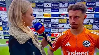 بالدوري الألماني.. مذيعة تقع في خطأ محرج مع لاعب على الهواء وتعتذر (فيديو)