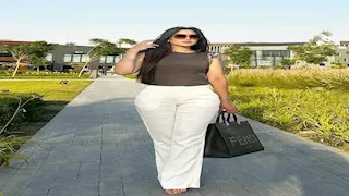 "خرزة زرقا".. 16 صورة لزوجة محمد عواد حارس مرمى الزمالك