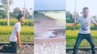 شاب يراهن على حياته تحت قطار سريع.. فيديو يثير الجدل 