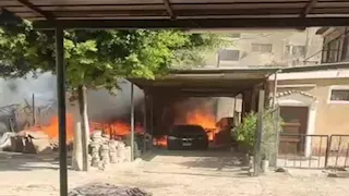 الحماية المدنية تسيطر على حريق بسيارة في القناطر الخيرية (صور)