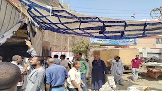 بالصور- إخلاء سوق التحرير العشوائي بأبنوب 