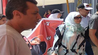 "لا يا بيبو لا".. لافتات لمحمود الخطيب في الجمعية العمومية للأهلي (صور)