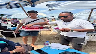 احتفالًا بالمولد النبوي.. توزيع الشربات على رواد شواطئ الإسكندرية – صور