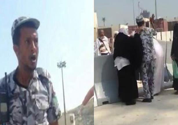 رجل أمن سعودي يعتدي على حاج ويصفعه