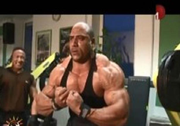 شاهد بطل العالم فى كمال الاجسام الملقب بالراجل الاخضر او the rock 