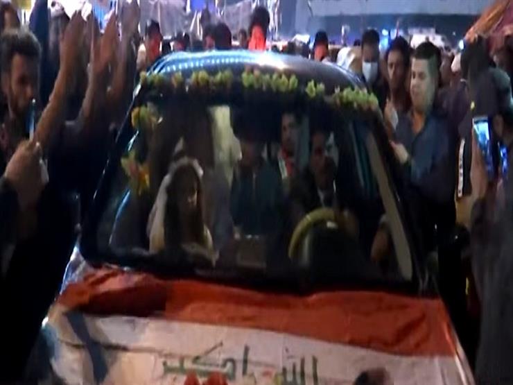بالفيديو.. حفل زفاف وسط المظاهرات في "ساحة التحرير" بالعراق