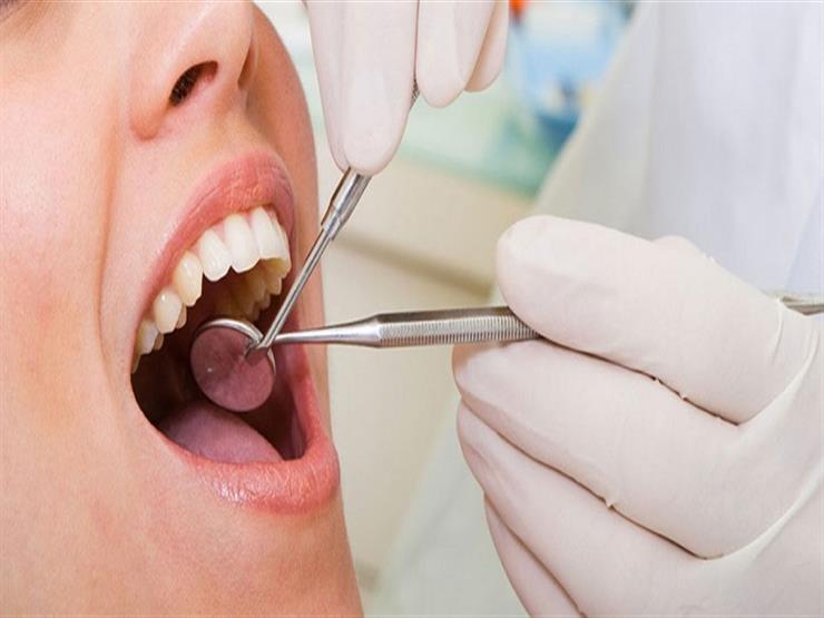 تنظيف الأسنان واللثة قد يحمي من ألزهايمر مصراوى