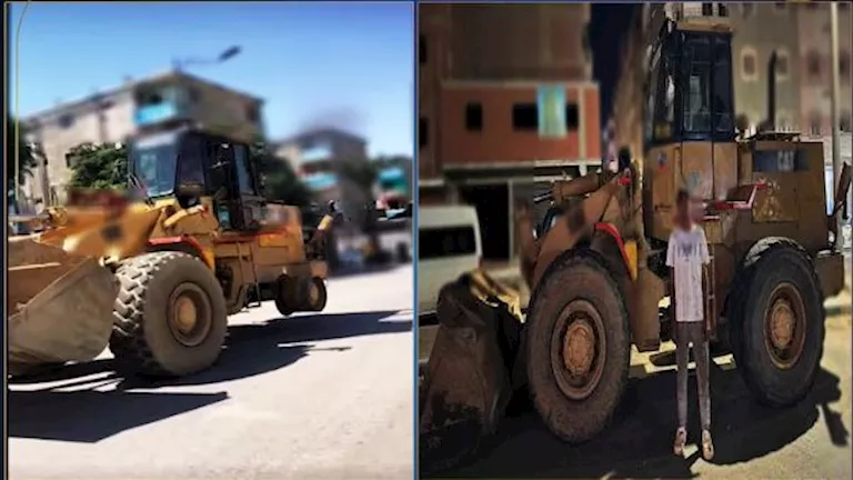 بالفيديو.. لودر بدون إطار وسائق عاري يثير الجدل في السويس