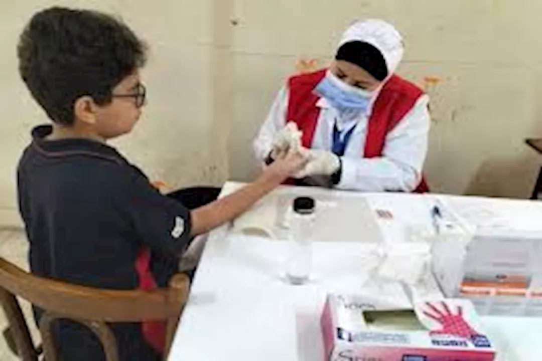 فحص طلاب المدارس
