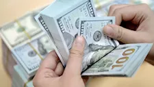 الذهب يتراجع والدولار يرتفع عالميا عقب قرار المركزي الأمريكي لسعر الفائدة 