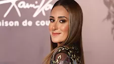 Shorts suit بالأحمر الناري.. أمينة خليل تخطف الأنظار في سابع أيام مهرجان