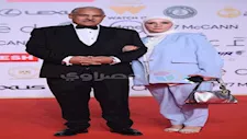 "مُحجبة وأنيقة".. زوجة محمد رضوان تخطف الأنظار في العرض الخاص لفيلم "كلب ساكن"