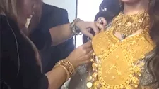 حين يصبح امتلاك الذهب عبئًا.. عروس عراقية تعجز عن الوقوف في حفل زفافها   