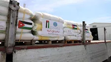 الأردن: عبور 85 شاحنة محملة بالمواد الإغاثية إلى غزة